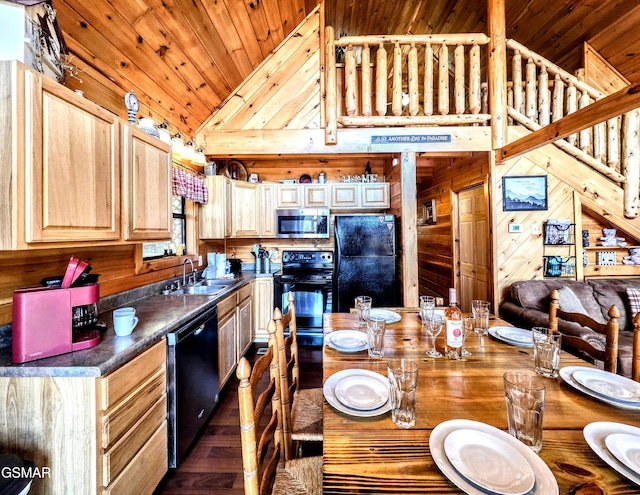 kitchen with light brown cabinetry, wood walls, wooden ceiling, black appliances, and a sink