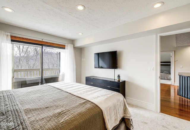 1130 Ski View Dr Unit 315, Gatlinburg, TN 37738 - bedroom featuring recessed lighting, a textured ceiling, and carpet