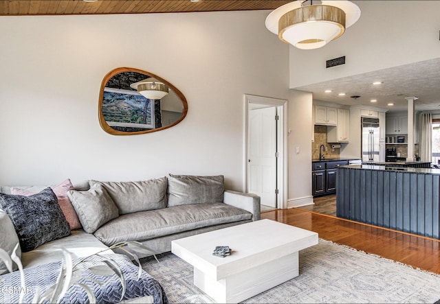 1130 Ski View Dr Unit 315, Gatlinburg, TN 37738 - living area with dark wood finished floors, recessed lighting, wooden ceiling, and a towering ceiling