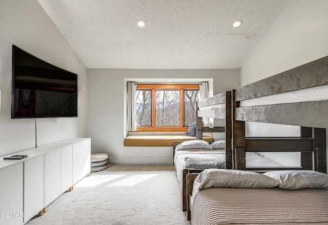 1130 Ski View Dr Unit 315, Gatlinburg, TN 37738 - bedroom with carpet flooring, a textured ceiling, and vaulted ceiling