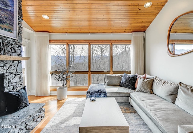 1130 Ski View Dr Unit 315, Gatlinburg, TN 37738 - living area featuring wooden ceiling, a stone fireplace, lofted ceiling, wood finished floors, and recessed lighting