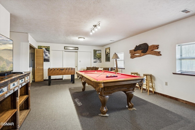 game room with visible vents, billiards, a textured ceiling, and carpet flooring