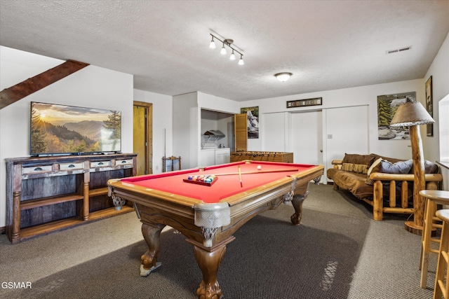 playroom featuring visible vents, pool table, carpet, a textured ceiling, and washing machine and dryer