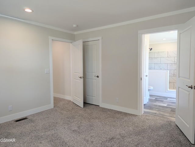 141 Hill Loop, Madisonville, TN 37354 - unfurnished bedroom with carpet flooring, ornamental molding, baseboards, ensuite bath, and recessed lighting