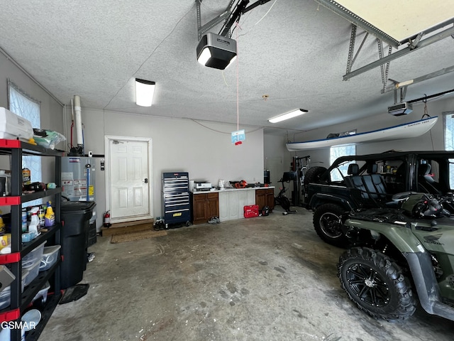 garage featuring a garage door opener, gas water heater, and a workshop area