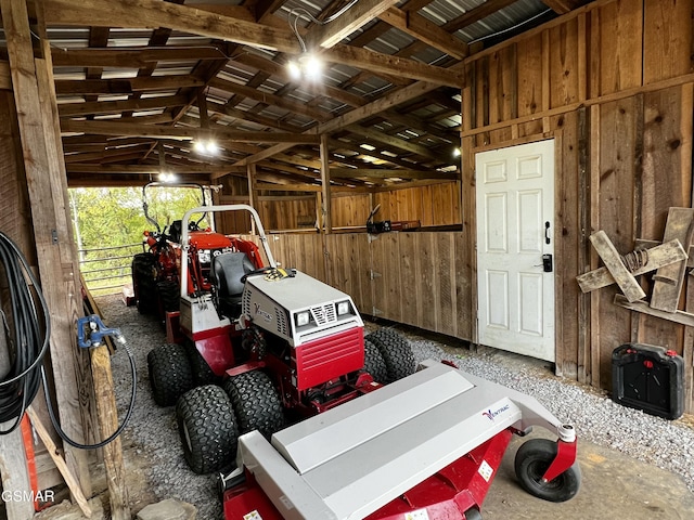 garage with wood walls