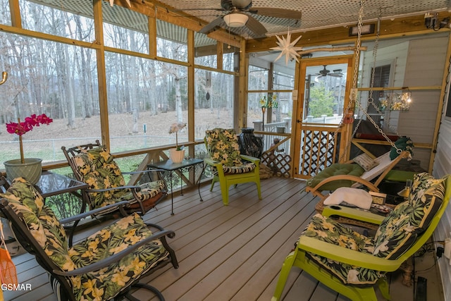 sunroom / solarium with ceiling fan