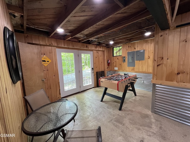 222 Poplar Ln, Gatlinburg, TN 37738 - recreation room with electric panel, unfinished concrete flooring, and wood walls