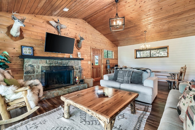 living room featuring a stone fireplace, wooden ceiling, dark wood finished floors, and an inviting chandelier