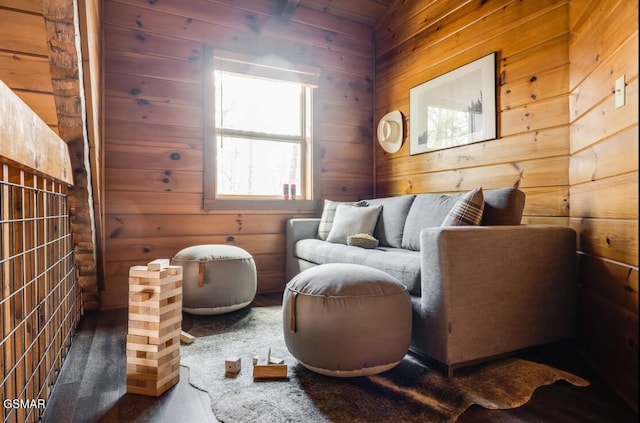 sitting room with wood walls