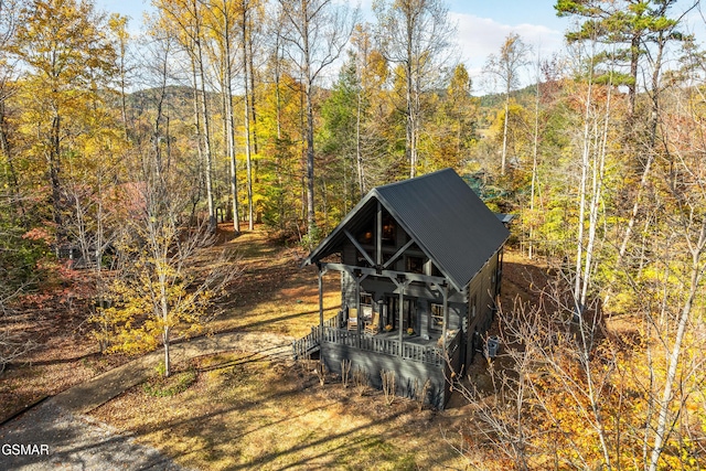 view of outbuilding featuring a porch