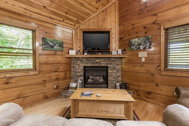 4110 Kidds Way Unit 5, Gatlinburg, TN 37738 - living area with wood walls, lofted ceiling, wood finished floors, and a fireplace