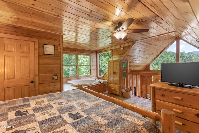 4110 Kidds Way Unit 5, Gatlinburg, TN 37738 - bedroom featuring wooden ceiling, wooden walls, multiple windows, lofted ceiling, and carpet