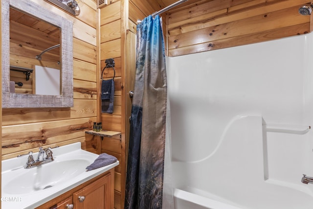 4110 Kidds Way Unit 5, Gatlinburg, TN 37738 - bathroom featuring vanity, shower / bath combo, and wooden walls