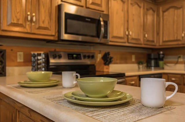 kitchen with range with electric cooktop