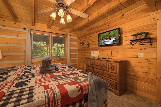 bedroom with beam ceiling, ceiling fan, wooden walls, and wood ceiling