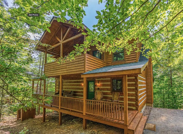 view of outbuilding with a porch