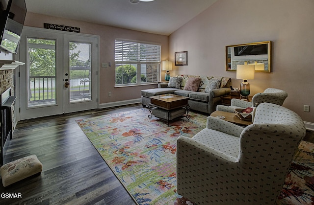 220 River Garden Ct Unit 38, Sevierville, TN 37862 - living room with baseboards, french doors, wood finished floors, and lofted ceiling