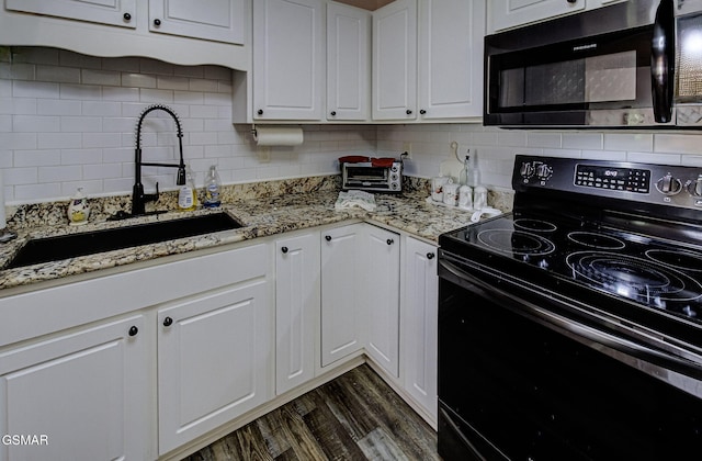 220 River Garden Ct Unit 38, Sevierville, TN 37862 - kitchen featuring dark wood-type flooring, a sink, black range with electric cooktop, and white cabinets
