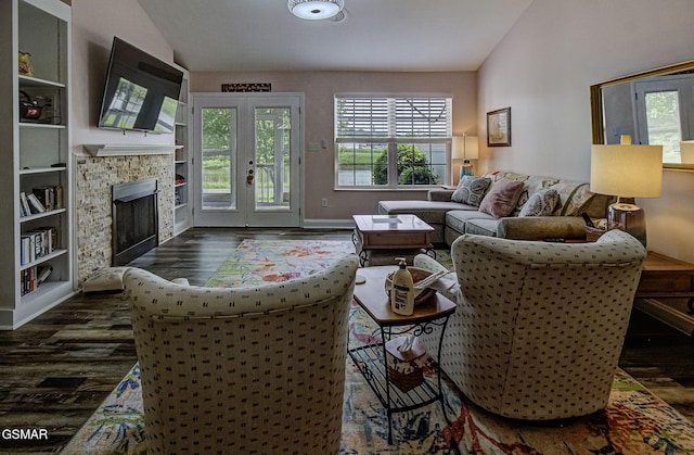 220 River Garden Ct Unit 38, Sevierville, TN 37862 - living room featuring french doors, dark wood finished floors, lofted ceiling, and a fireplace