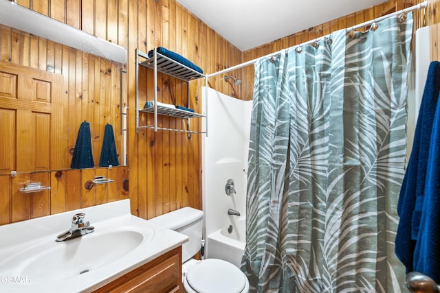 2295 Bluff Mountain Rd, Sevierville, TN 37876 - full bathroom with wood walls, shower / bath combo, toilet, and vanity