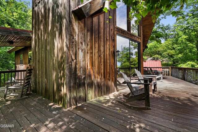 2295 Bluff Mountain Rd, Sevierville, TN 37876 - wooden deck featuring view of wooded area