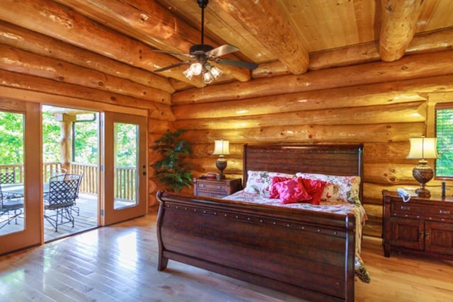 bedroom featuring wooden ceiling, access to outside, light hardwood / wood-style floors, rustic walls, and beam ceiling