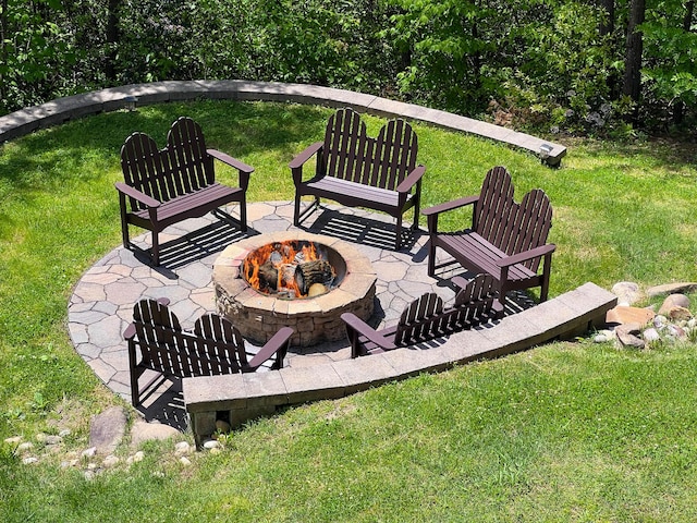 view of patio featuring a fire pit