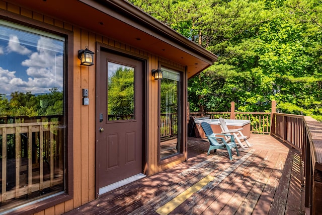 entrance to property with a wooden deck