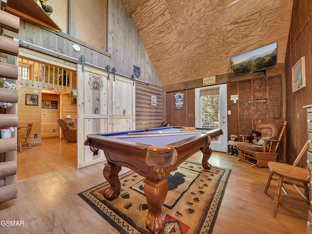 1518 Ridgecrest Dr, Sevierville, TN 37876 - playroom with high vaulted ceiling, a barn door, wooden ceiling, billiards table, and wood walls