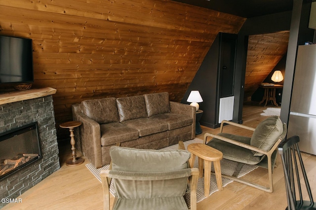 2008 Mindy Jo Way, Sevierville, TN 37862 - living room with wood finished floors, vaulted ceiling, a fireplace, and wood walls