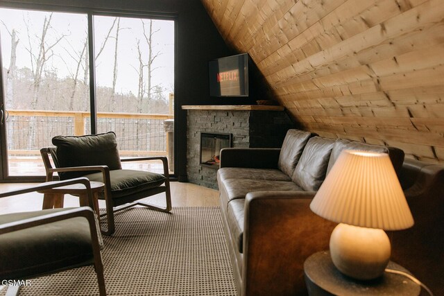 2008 Mindy Jo Way, Sevierville, TN 37862 - living room featuring wooden ceiling, healthy amount of natural light, wood finished floors, lofted ceiling, and a stone fireplace