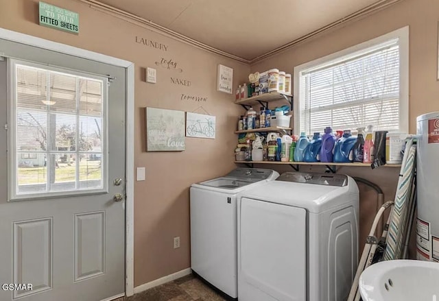 211 Valley Dr, Pigeon Forge, TN 37863 - laundry room featuring separate washer and dryer, plenty of natural light, ornamental molding, and water heater