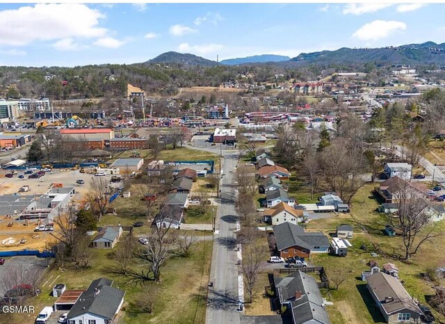 211 Valley Dr, Pigeon Forge, TN 37863 - aerial view of property and surrounding area featuring mountains and nearby suburban area
