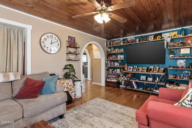 211 Valley Dr, Pigeon Forge, TN 37863 - living room with arched walkways, ceiling fan, wood finished floors, wood ceiling, and crown molding