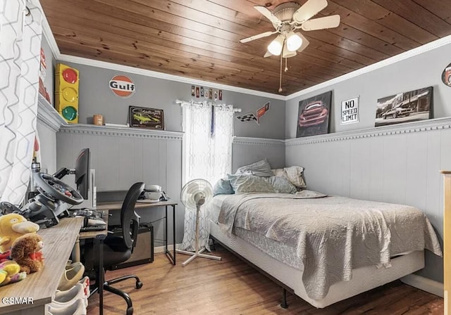 211 Valley Dr, Pigeon Forge, TN 37863 - bedroom featuring ornamental molding, wooden ceiling, a wainscoted wall, a desk, and wood finished floors