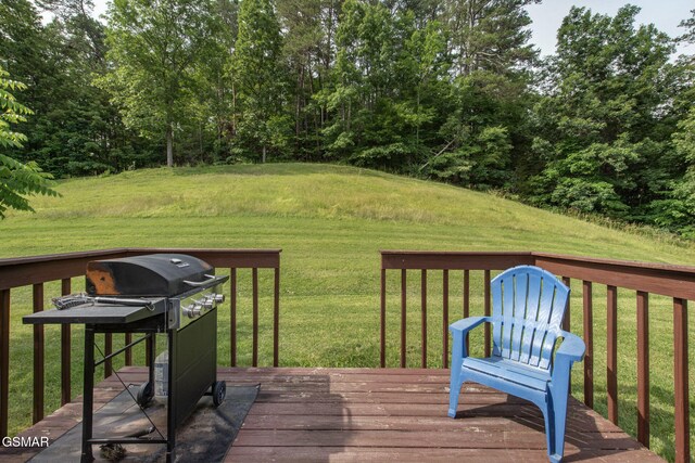 1315 Mccarter Hollow Rd, Sevierville, TN 37862 - wooden deck featuring a yard