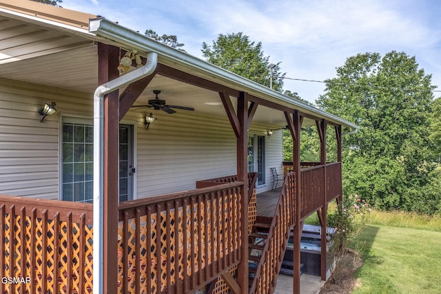1315 Mccarter Hollow Rd, Sevierville, TN 37862 - wooden deck featuring ceiling fan and a yard
