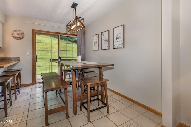 1315 Mccarter Hollow Rd, Sevierville, TN 37862 - dining space with a chandelier and light tile patterned floors