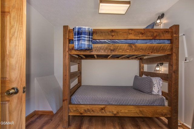 1315 Mccarter Hollow Rd, Sevierville, TN 37862 - bedroom with wood finished floors and baseboards