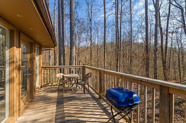 wooden deck with grilling area