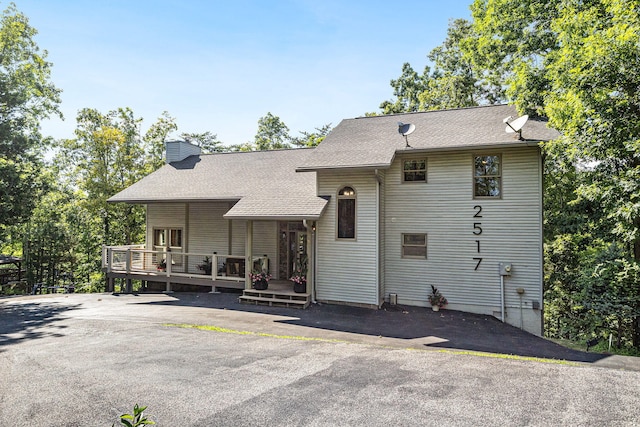 2517 Angler Way, Sevierville, TN 37876 - back of property with a chimney, a shingled roof, and a wooden deck