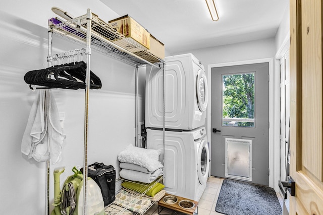 2517 Angler Way, Sevierville, TN 37876 - laundry room with stacked washer / dryer and light tile patterned floors