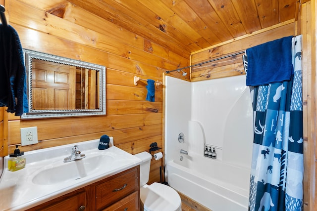 full bath featuring wooden ceiling, vanity, toilet, and wooden walls