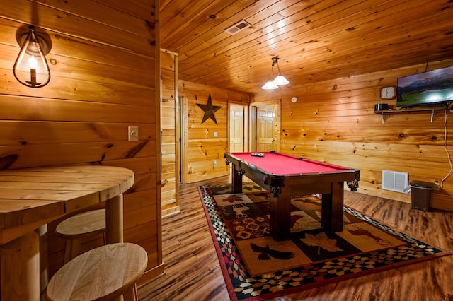 playroom with wooden walls, wood-type flooring, wood ceiling, and billiards