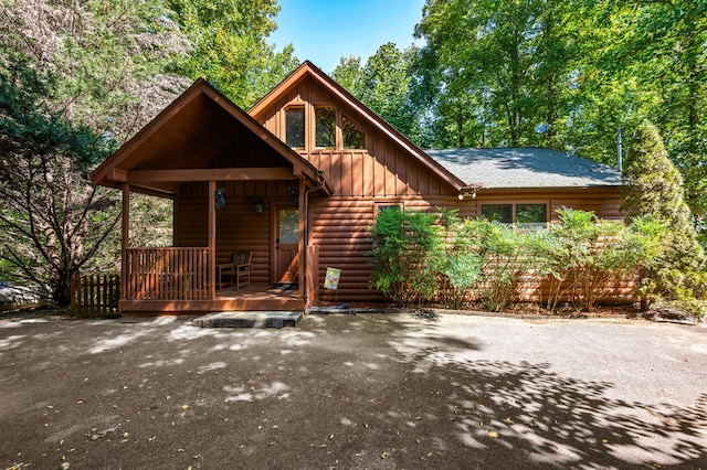 cabin with covered porch