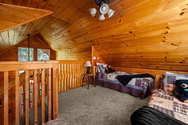 unfurnished bedroom featuring carpet flooring, wooden walls, wood ceiling, and vaulted ceiling