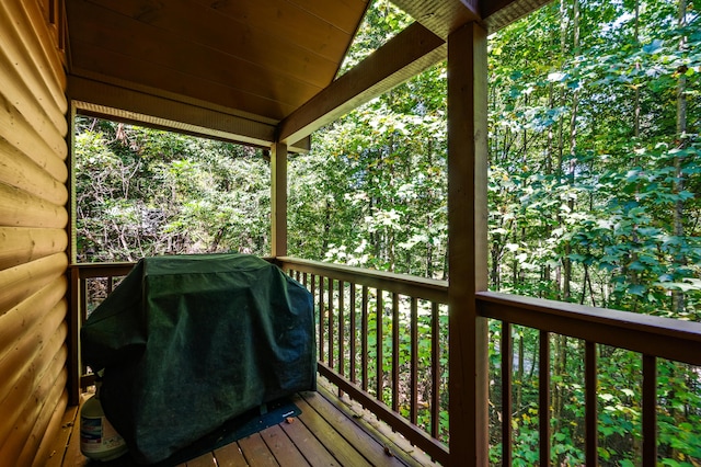 wooden deck with grilling area