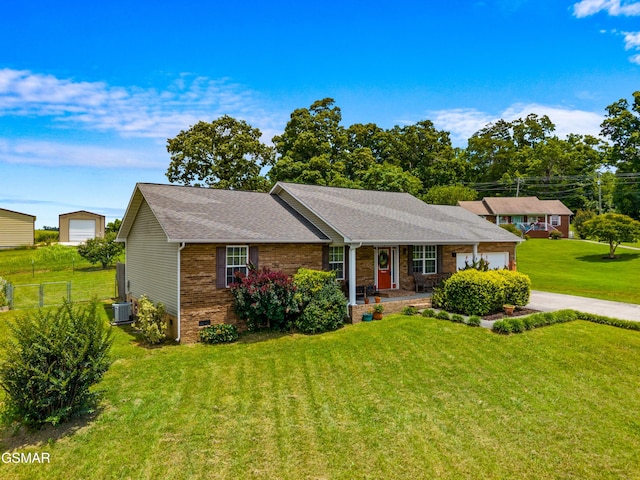 923 Red Oak Ln, Dandridge, TN 37725 - ranch-style house with an attached garage, brick siding, concrete driveway, a shingled roof, and covered porch