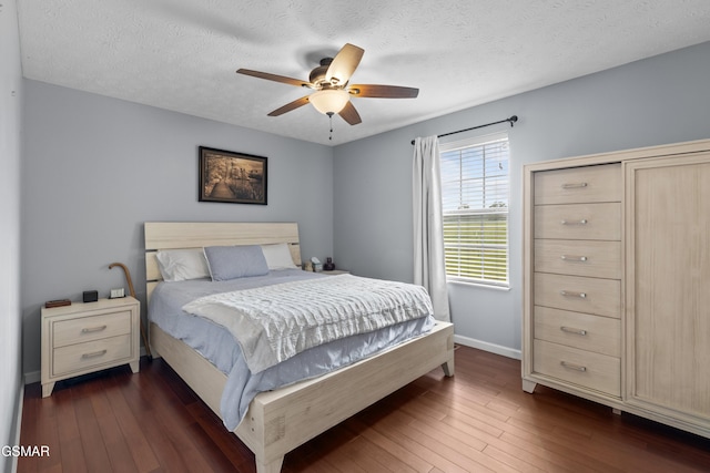 923 Red Oak Ln, Dandridge, TN 37725 - bedroom with dark wood finished floors, a textured ceiling, and a ceiling fan